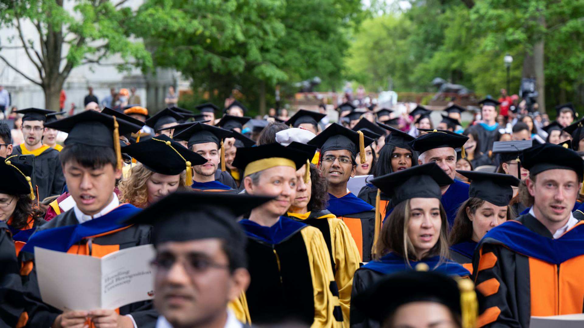 Graduate students at hooding ceremony