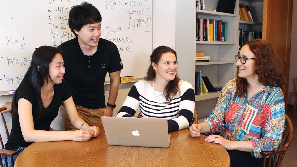 Computer scientist Barbara Engelhardt (center) leads a research group that is deciphering gene-expression data