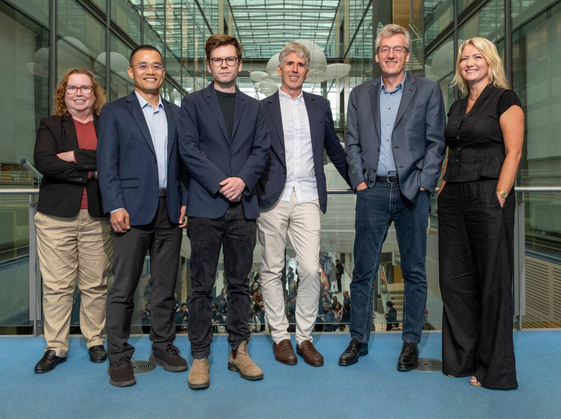 Cancer research team poses in Frick Chemistry Lab