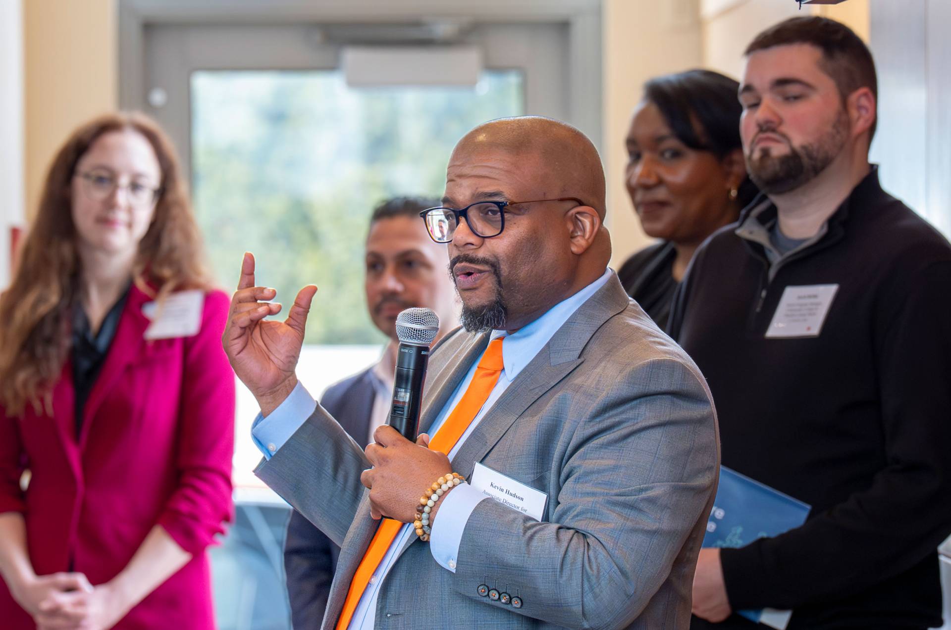 Kevin Hudson holding microphone