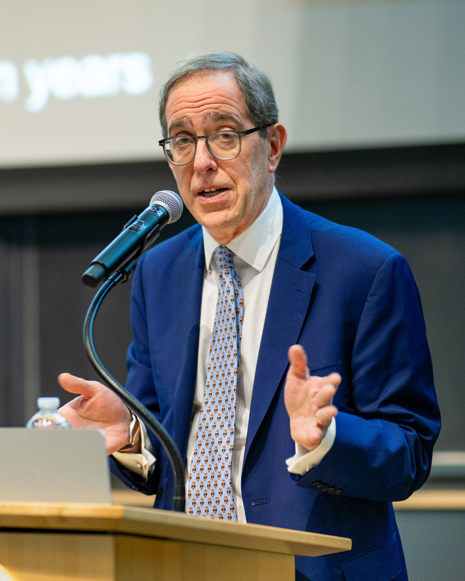 President Eisgruber talking at the podium