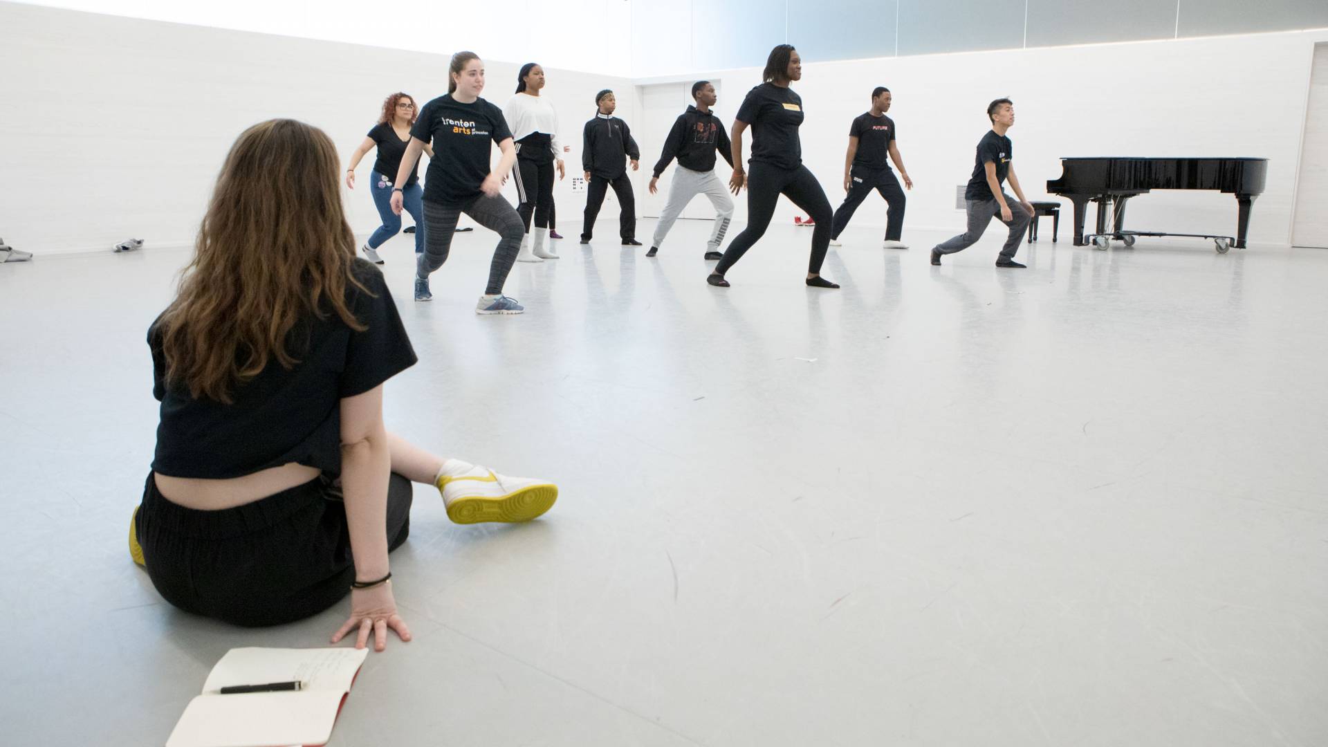 Sophie Blue watches dancers