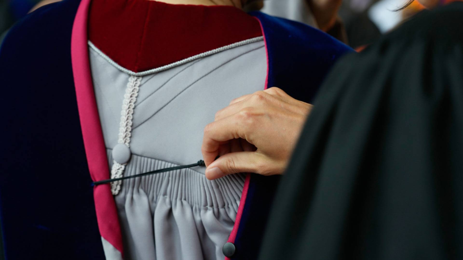 The gowns and hoods of academic regalia trace their history to medieval Europe, when heavy woolen robes were necessary in universities' cold, stone halls.