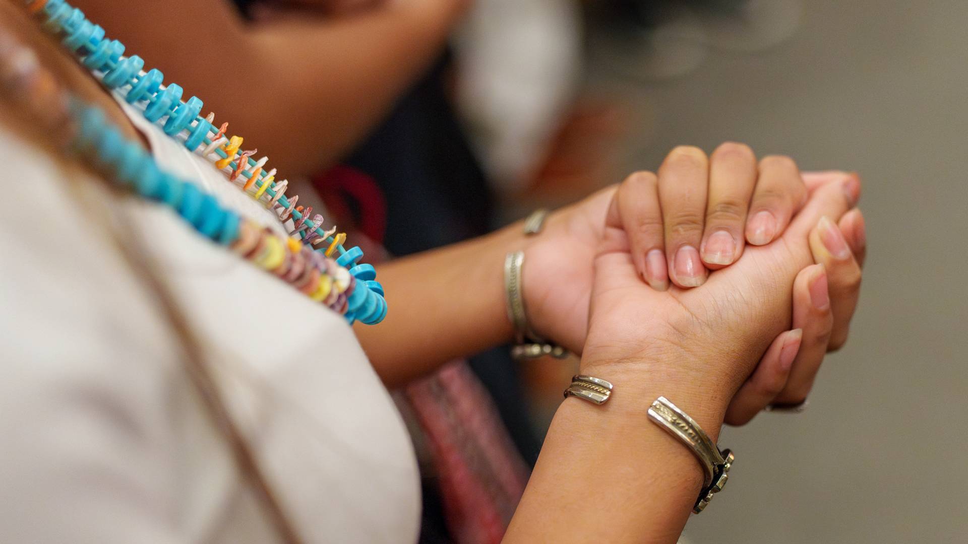 A close-up of a students' closed hands.