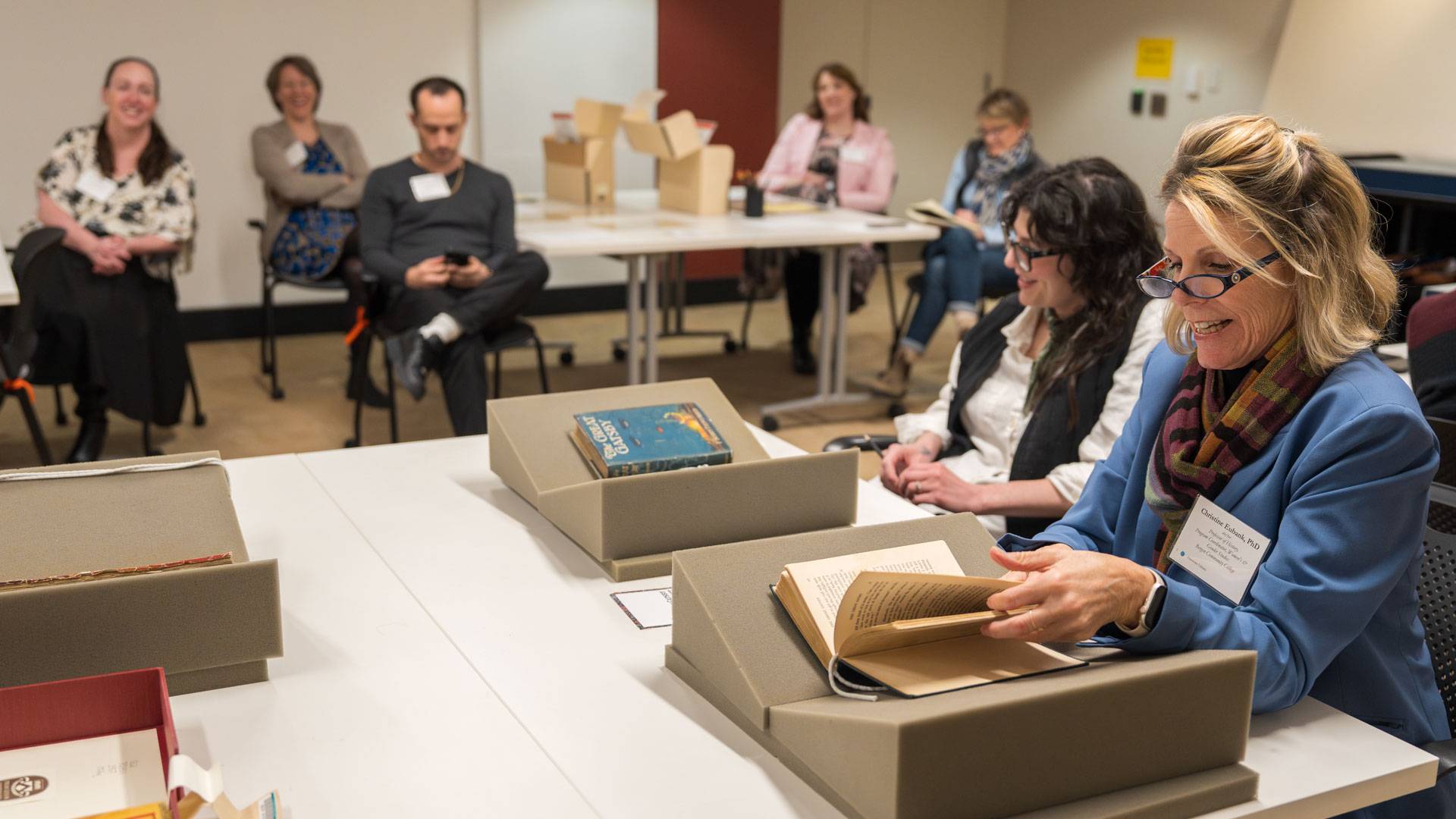 Educators looking at books in Princeton University Library's Special Collections room.