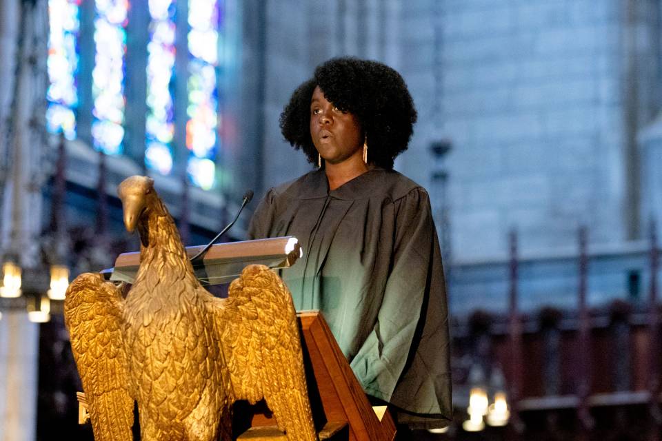 Rhoda Lynch speaking at podium