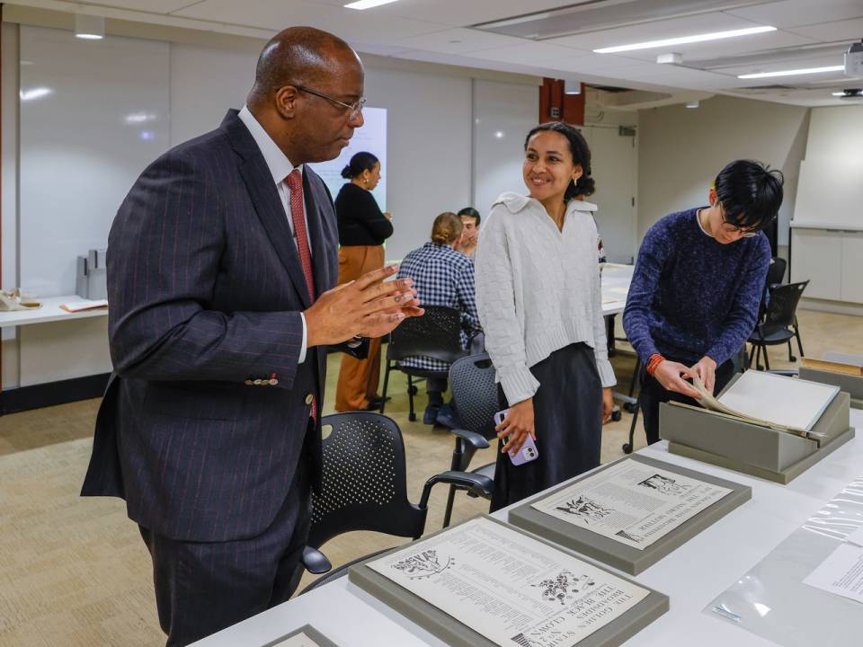 Dean of the Faculty Gene Jarrett (left), the William S. Tod Professor of English, works with undergraduate and graduate students to analyze some of the Black and African American literary artifacts housed at Princeton University Library's Department of Special Collections.