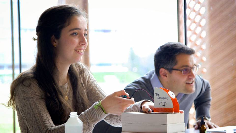 Sylvie Thon launches rocket while Prof