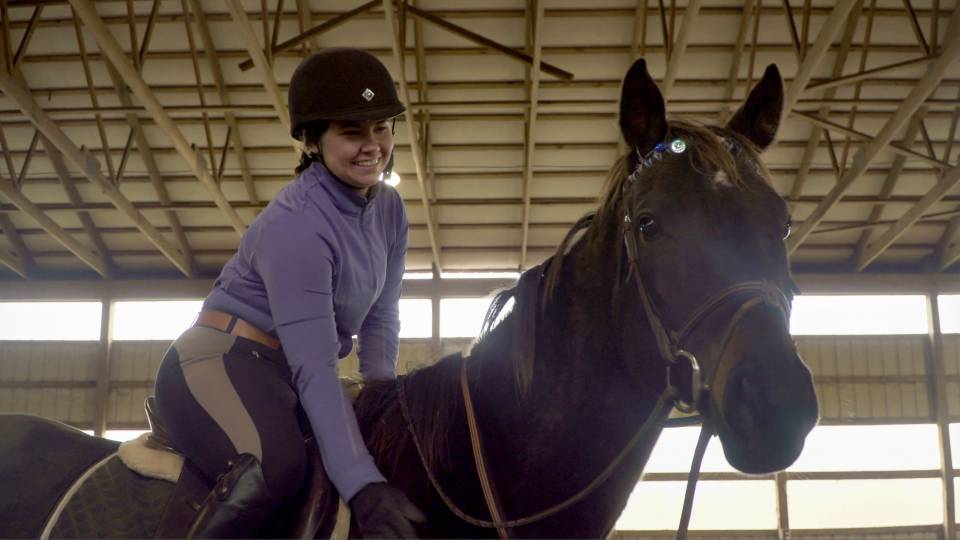 Jean Bellamy sitting on horse