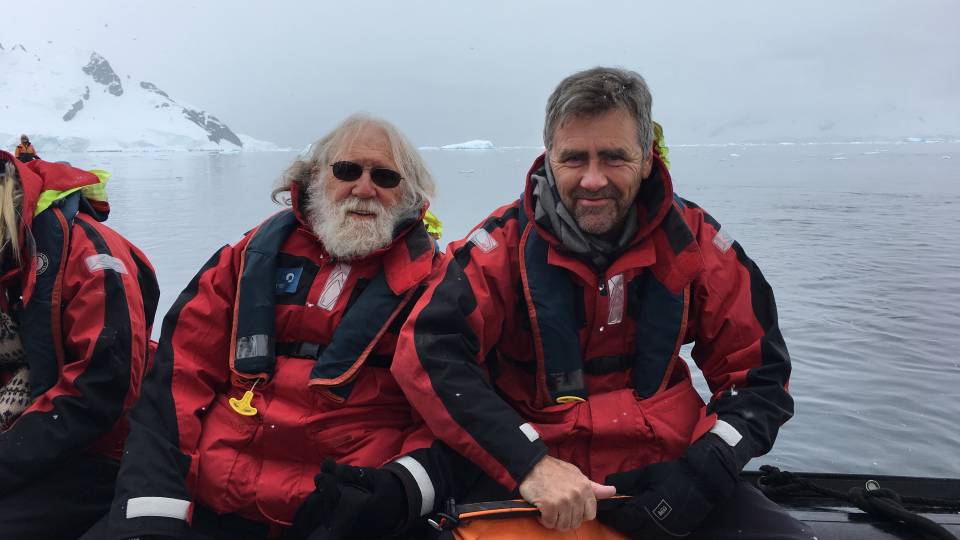 Charlie Gross and Tom Albright sitting in a boat in Antarctica