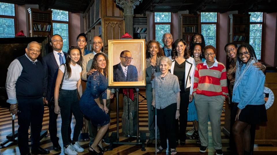 The Fields family poses with the painting