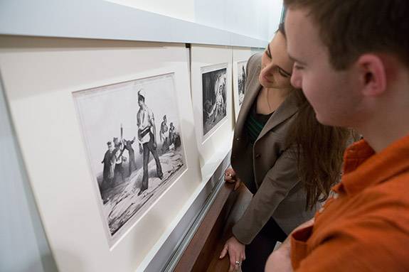 Freshman Seminar Caricature students at drawing