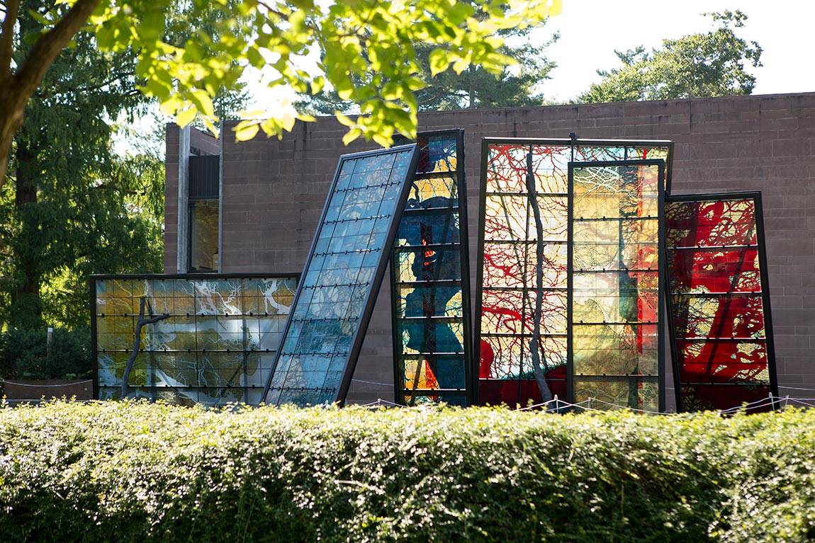 Starn "(Any) Body Oddly Propped" sculpture in front of Art Museum