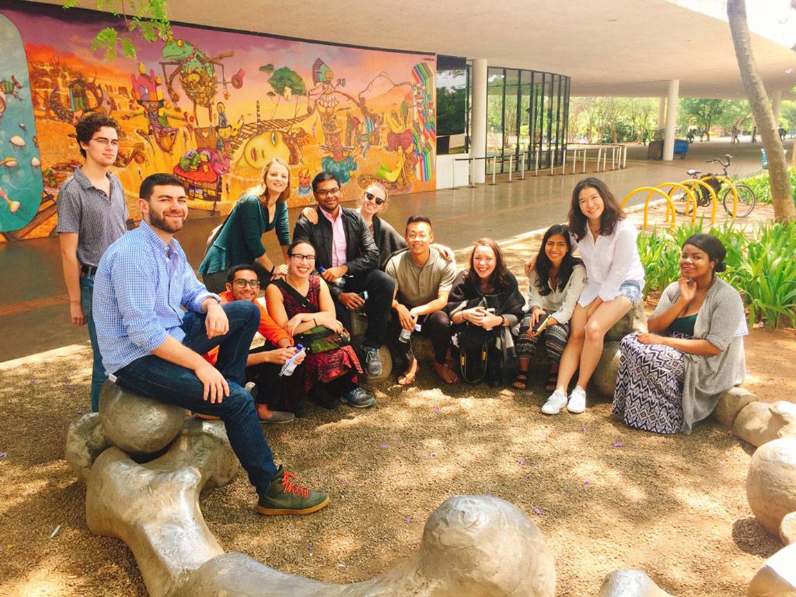 Students sitting in group outside in São Paulo