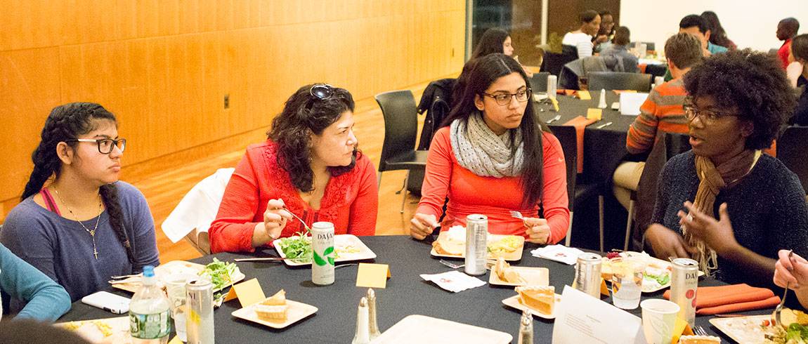 Scholars Institute Fellows Program (SIFP) students with Khristina Gonzalez at first-generation college students dinner