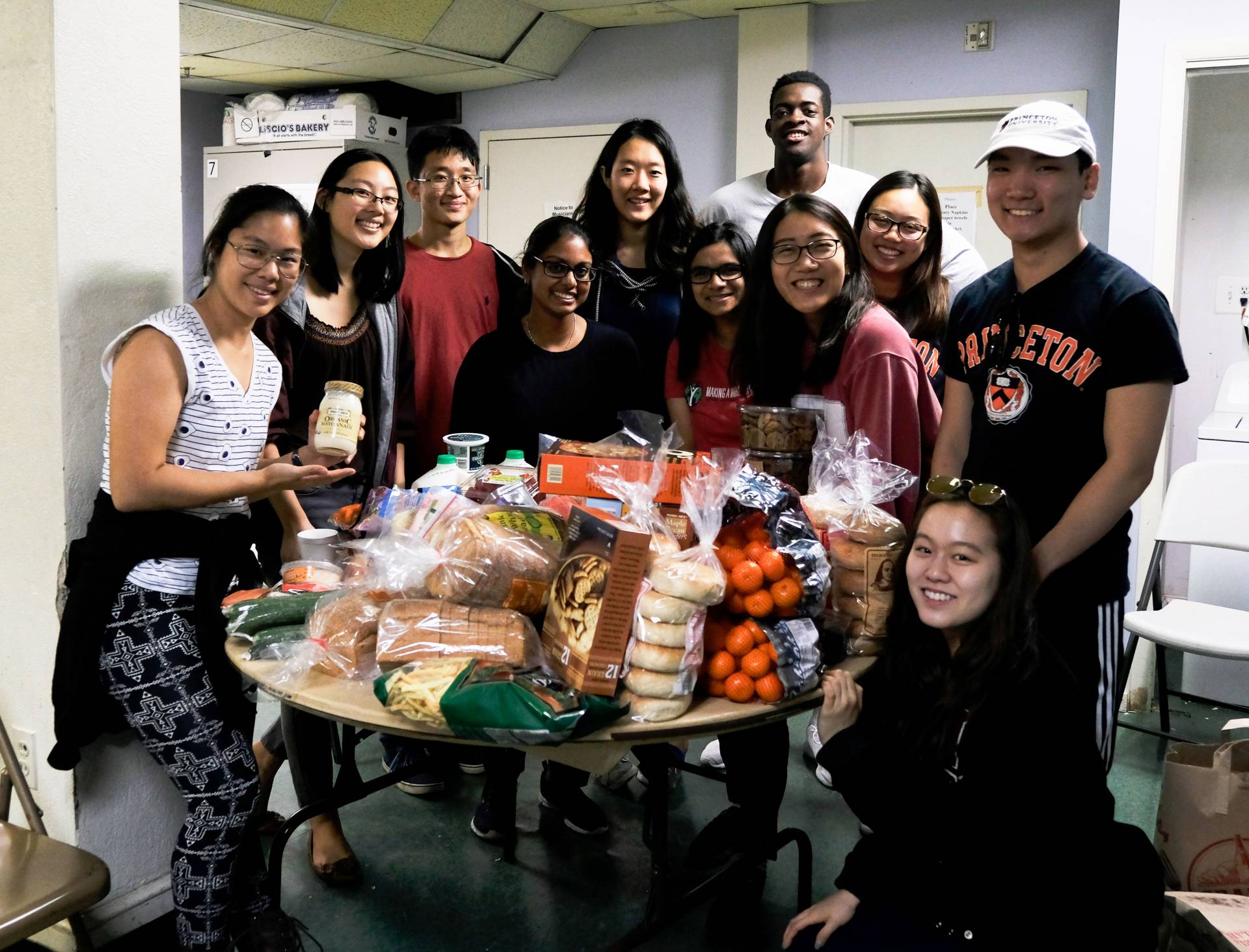 Students unpacking groceries at Arch Street Methodist Church