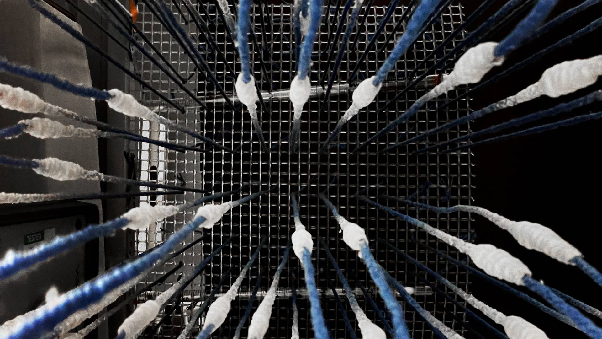 Hanging strings make a starburst pattern