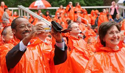 Families and friends photograph the seniors