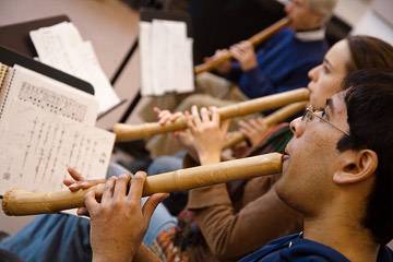 Students playing flutes