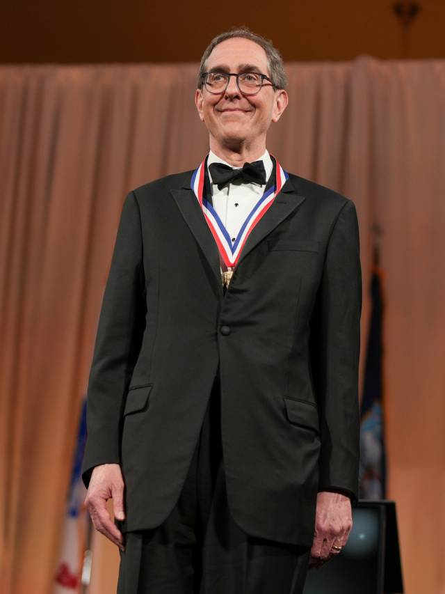 President Eisgruber wearing the Ellis Island medal