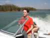 chrisdrivingtheboat_small.jpg